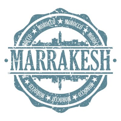 Sello Azul Viajar a Marrakech Sello en tonos azules con la palabra Marrakech en el centro y silueta de la ciudad